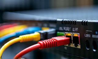 Image showing a network switch and cables, symbolising complex network infrastructure.